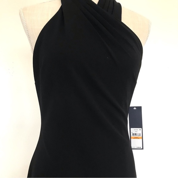 Black Rachel Roy midi dress in size small with slit at the bottom back. - Picture 5 of 14
